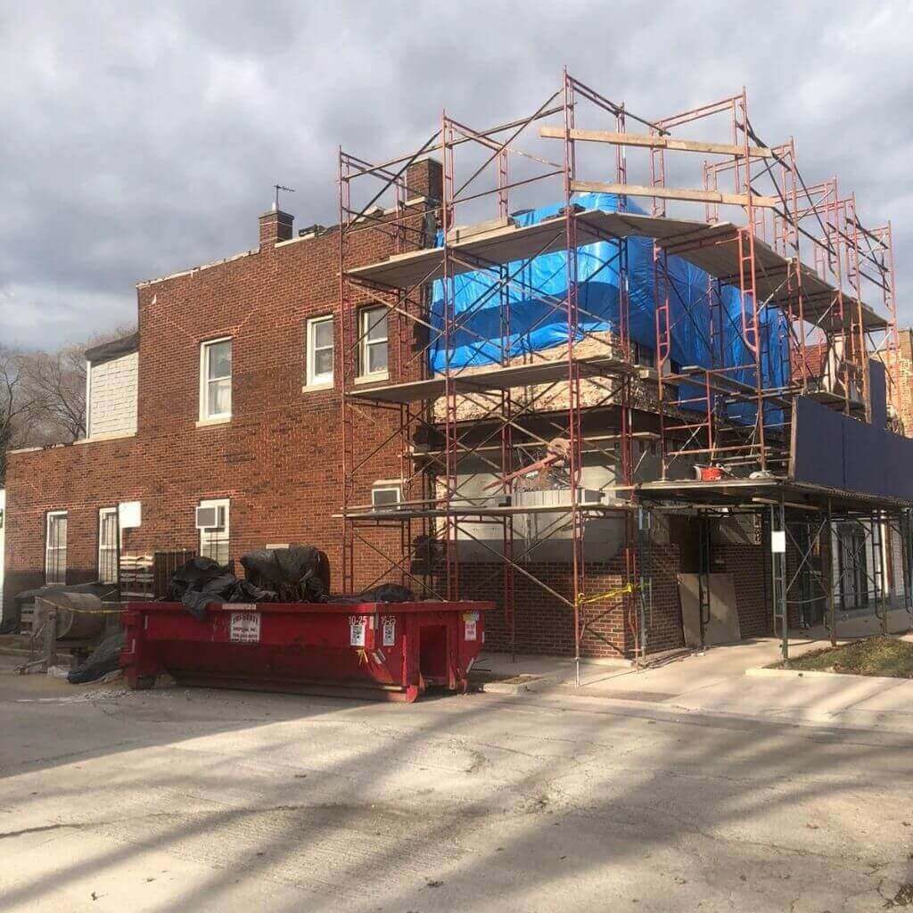 scaffolds surrounding a building during its restoration